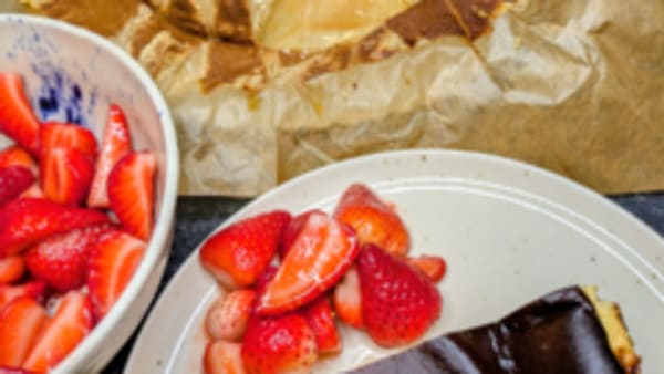Burnt Basque cheesecake with honey-macerated strawberries